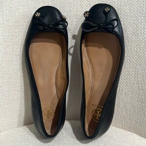Tory Burch flats with bow detail.